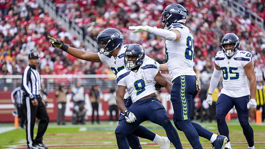 The Seattle Seahawks celebrate a Kenneth Walker III touchdown against the 49ers. (Thearon W. Henderson/Getty Images)